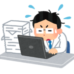 多忙な白衣の男性