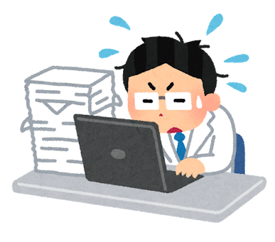 多忙な白衣の男性