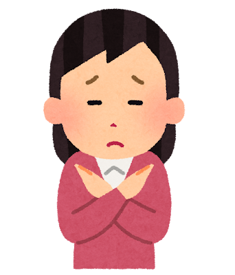 NGサインを出す女性