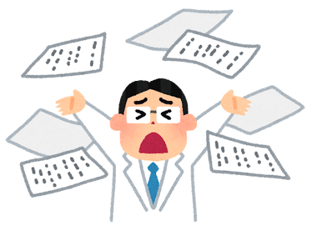 書類を投げ出す男性医師