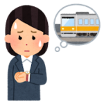 電車の遅延を心配する女性会社員